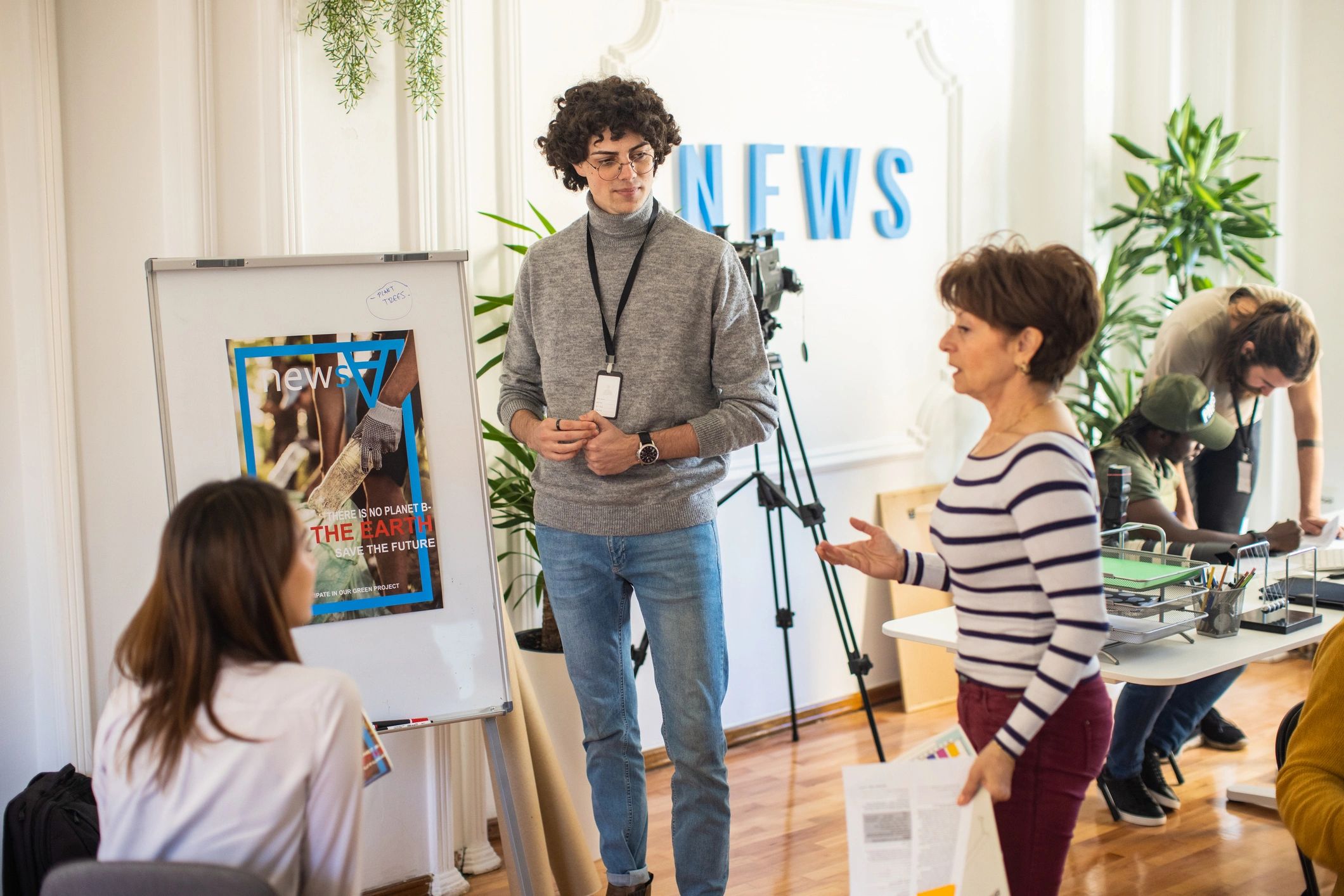 Editorial team meeting in a newsroom