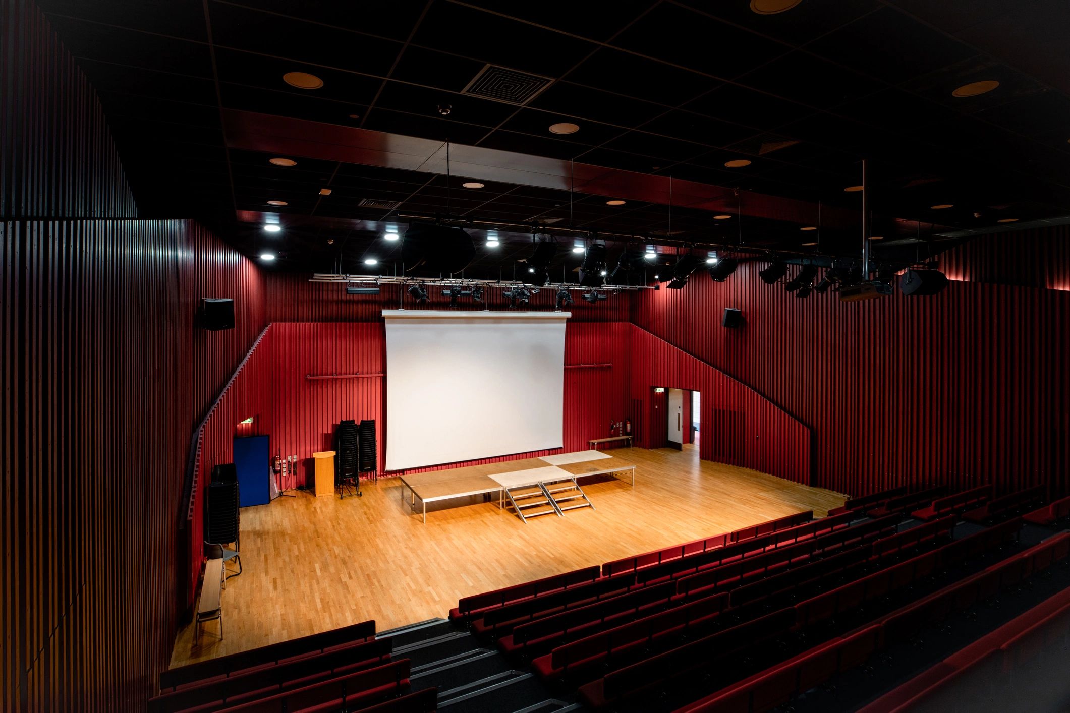 Wide view of a theater stage and seating